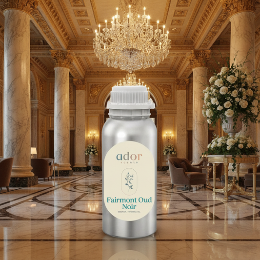 Fairmont Oud Noir essential diffuser oil by Ador Scents, styled in a luxury hotel lobby setting