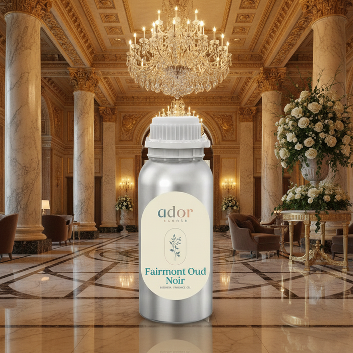 Fairmont Oud Noir essential diffuser oil by Ador Scents, styled in a luxury hotel lobby setting